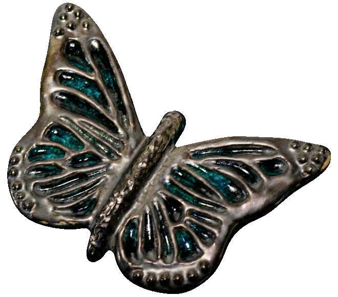 Ceramic butterfly with a silvery pewter-look glaze and teal glass set into its wings