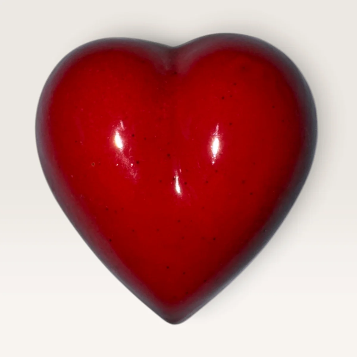 Plain, puffy ceramic heart in a high-gloss red